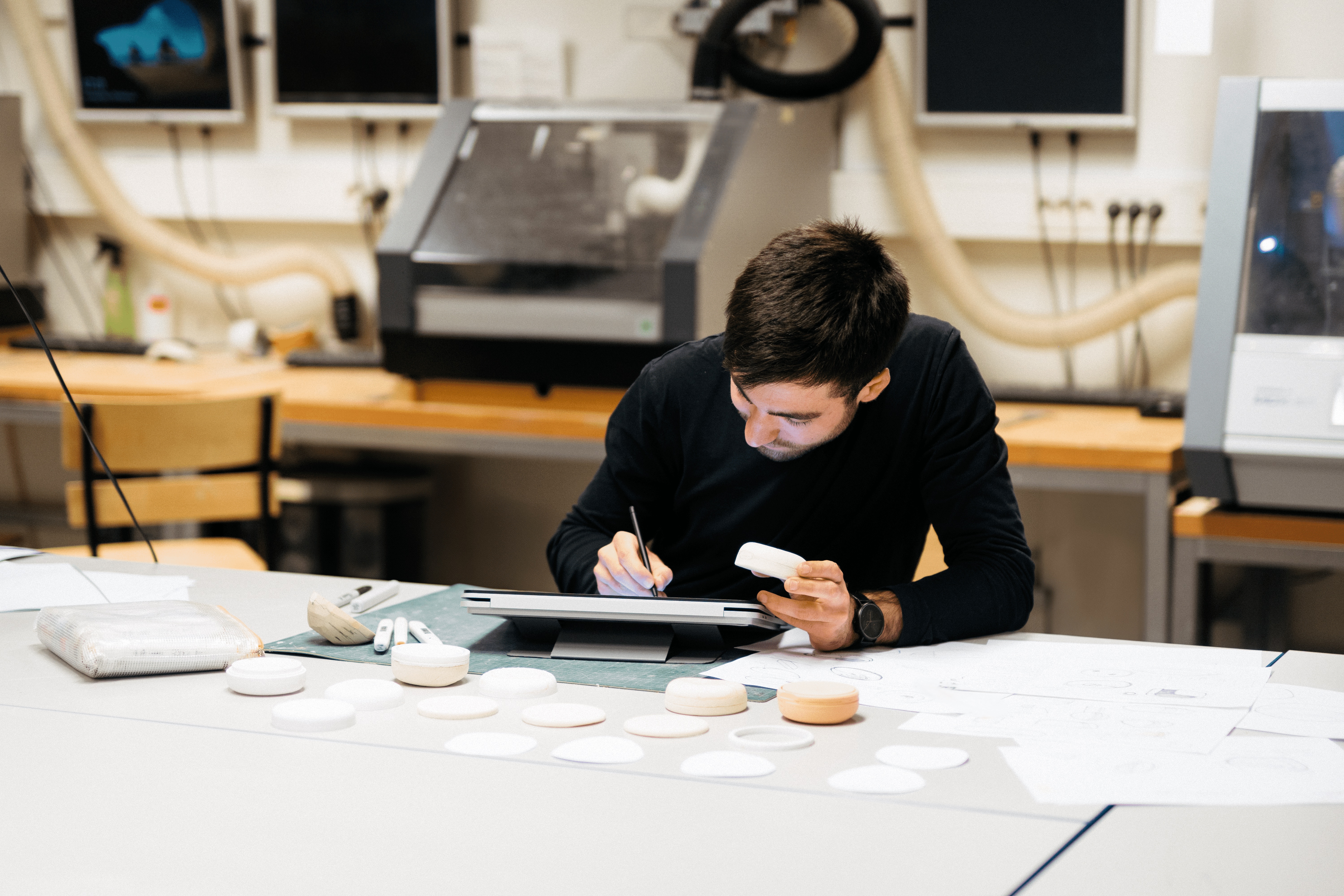 Nicolò Vincenzi working in the design studio