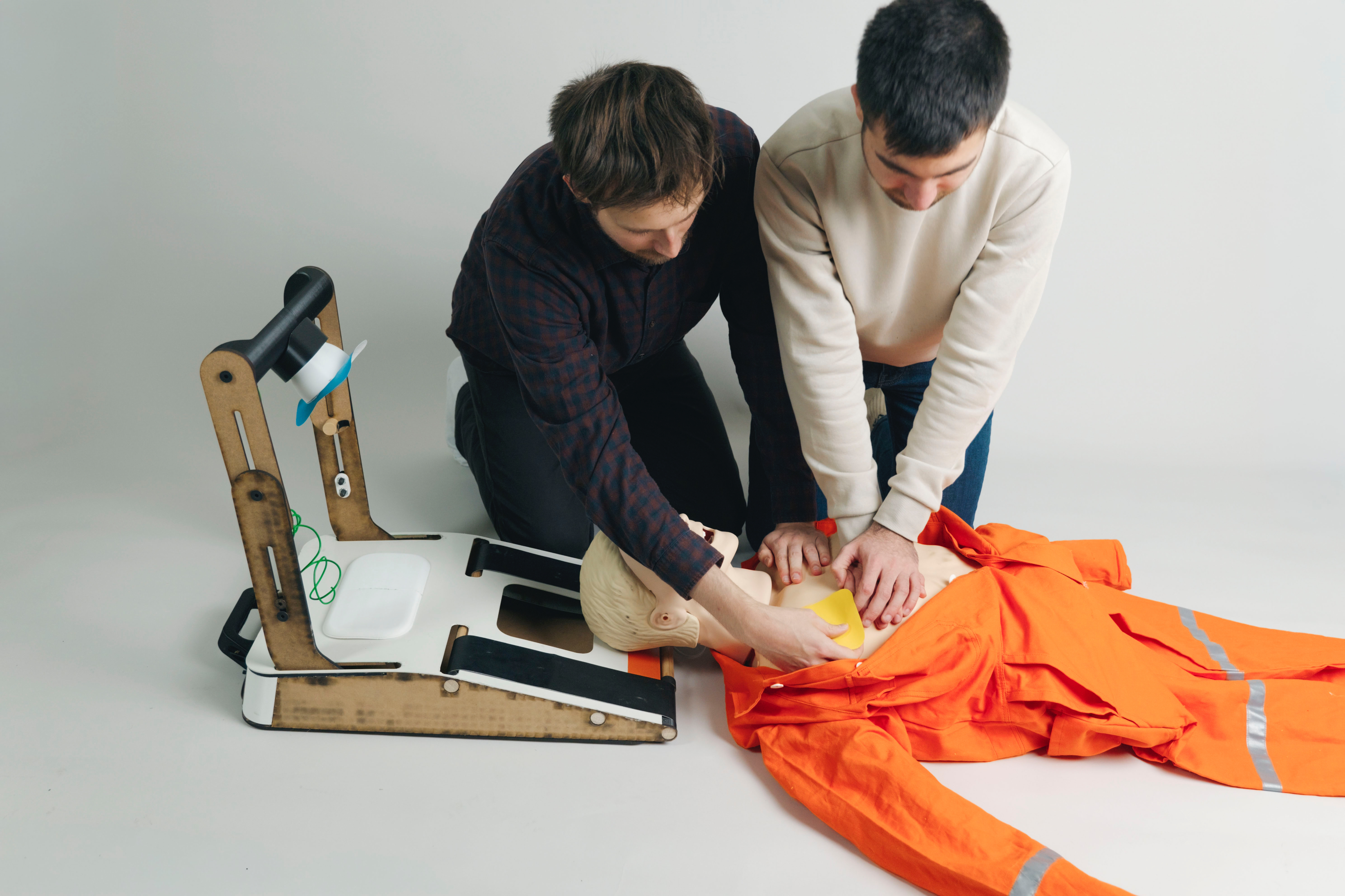 Two-person testing of compression machine prototype