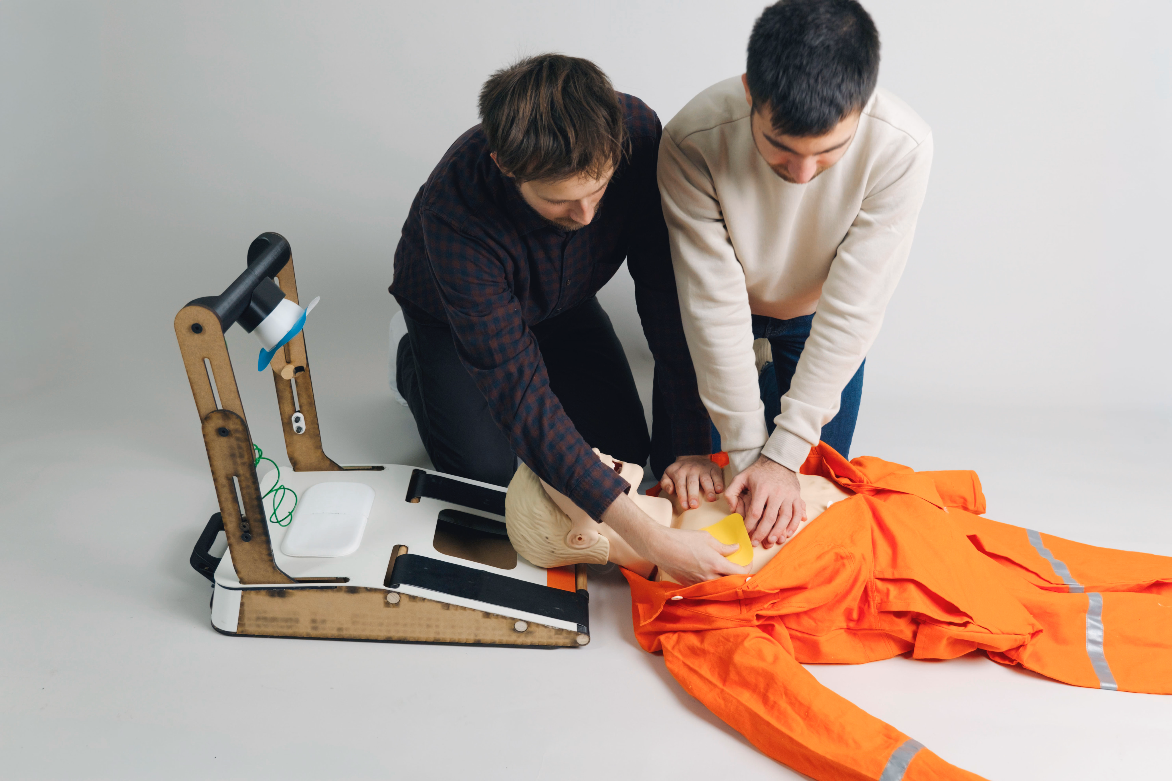 Two-person testing of compression machine prototype