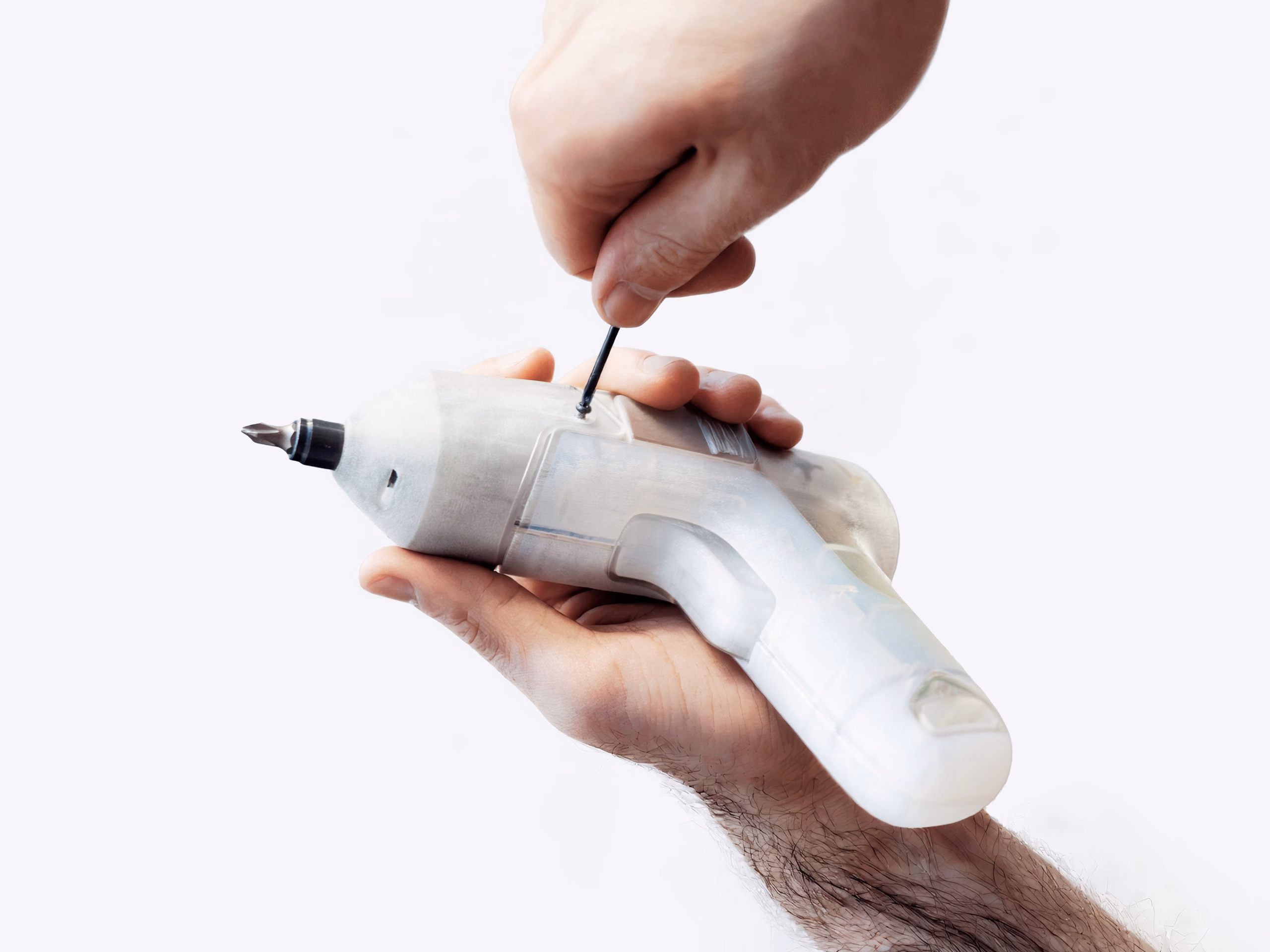 Hand holding functional prototype with integrated drill bit for balance testing