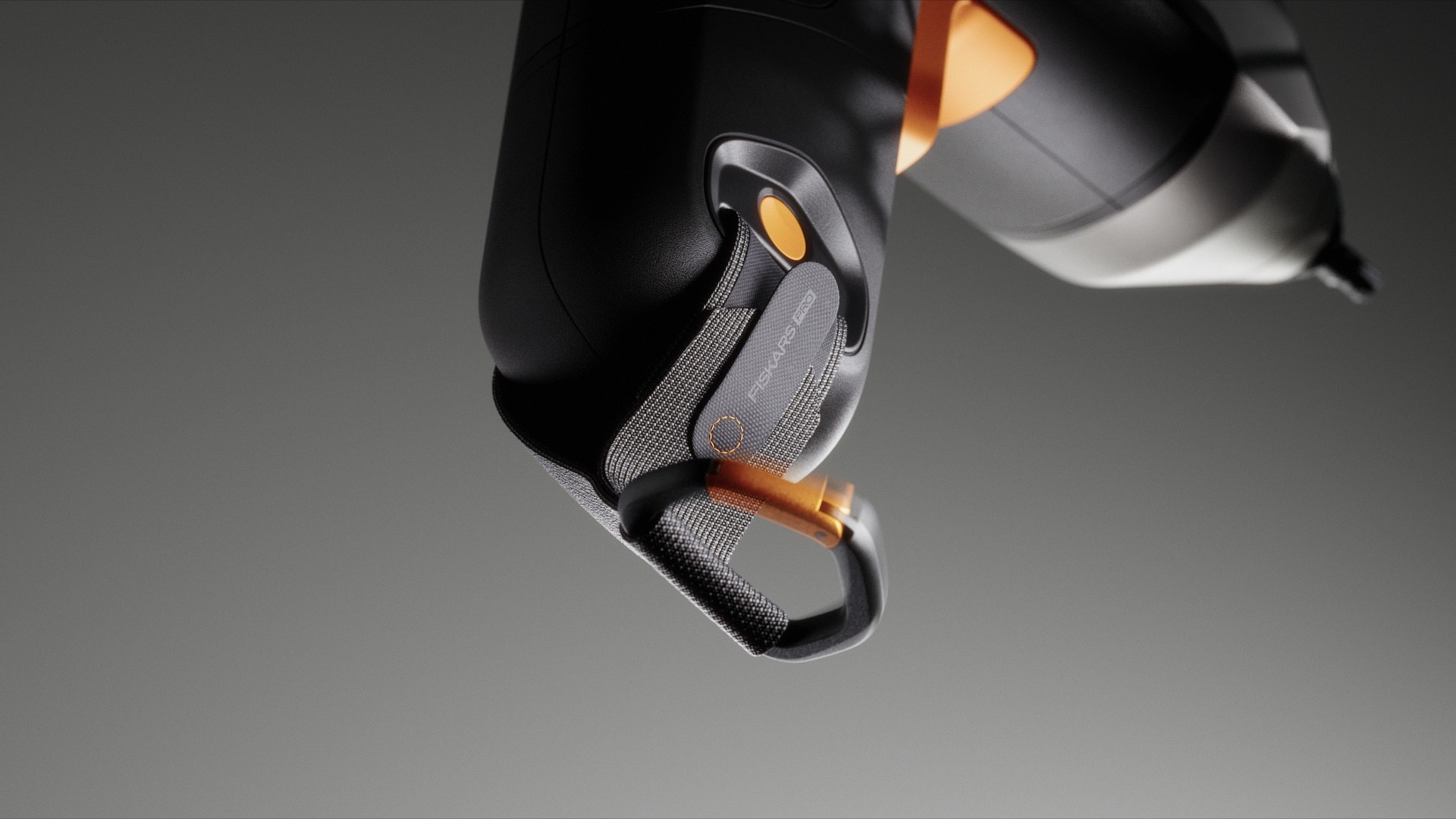 Pro Mini being held showing ergonomic grip with orange carabiner attachment for belt carry